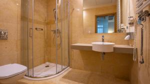 Kúpeľňa v ubytovaní VacationClub - Diune Hotel Apartament 115