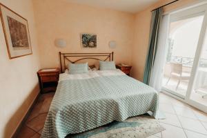Voodi või voodid majutusasutuse Romantik Hotel Castello Seeschloss toas