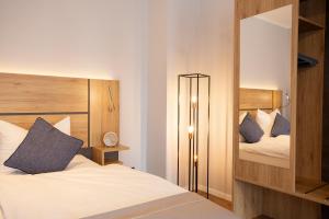 Ένα ή περισσότερα κρεβάτια σε δωμάτιο στο Chalet Bergzeit 5