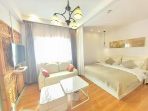 Lijiang Old Town Meiliju View Inn客房内的一张或多张床位