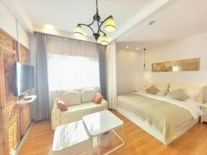 Lijiang Old Town Meiliju View Inn客房内的一张或多张床位