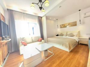 Lijiang Old Town Meiliju View Inn客房内的一张或多张床位
