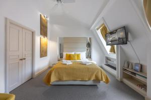 Posteľ alebo postele v izbe v ubytovaní President Boutique Apartments #8 by Goodnite cz