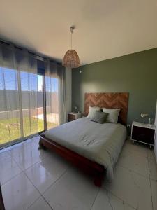 Postel nebo postele na pokoji v ubytování Villa Charpentier