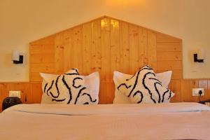 Voodi või voodid majutusasutuse Bayith Cafe and Stay toas