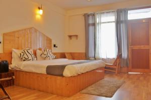 Voodi või voodid majutusasutuse Bayith Cafe and Stay toas