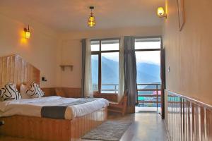 Voodi või voodid majutusasutuse Bayith Cafe and Stay toas
