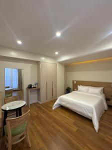 Tempat tidur dalam kamar di Hotel snowlion