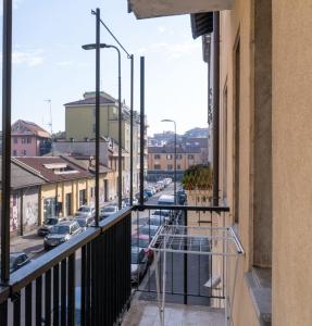a balcony with a view of a city street at LP Apartments - Navigli in Milan