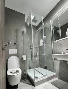 Ένα μπάνιο στο Comfort Boardinghouse