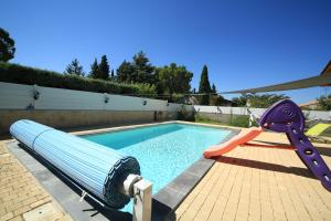The swimming pool at or close to FP La Cigale