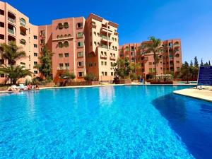 Πισίνα στο ή κοντά στο Piscine Hivernage plein Centre