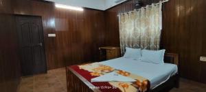 Postel nebo postele na pokoji v ubytování PALM Beach Resort, Alleppey