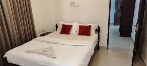 Postel nebo postele na pokoji v ubytování PALM Beach Resort, Alleppey