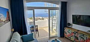 TV a/nebo společenská místnost v ubytování Ocean View Apartments