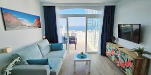 TV a/nebo společenská místnost v ubytování Ocean View Apartments