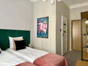 Postel nebo postele na pokoji v ubytování Milla Apartments