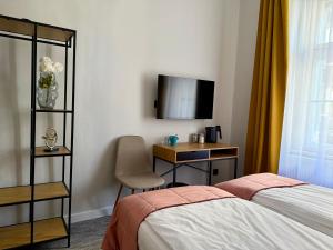 Postel nebo postele na pokoji v ubytování Milla Apartments