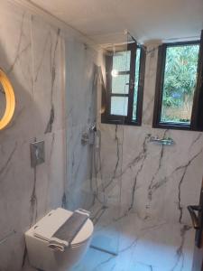 Kúpeľňa v ubytovaní Evangelos Apartments + 35 fotografií