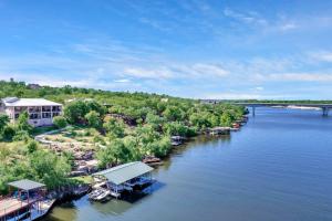 an aerial view of a river with boats on it at Lake Marble Falls on The Rocks and Concierge Service in Marble Falls