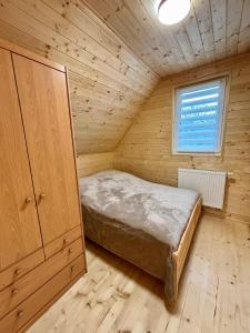 Posteľ alebo postele v izbe v ubytovaní Wellness House Prague Pohádkový Ráj