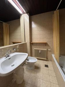 Kúpeľňa v ubytovaní Haus Schuschnig + 14 fotografií