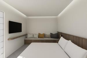 TV a/nebo společenská místnost v ubytování Galaxy Suites Boutique Resort