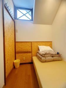 Postel nebo postele na pokoji v ubytování Amigo guest house