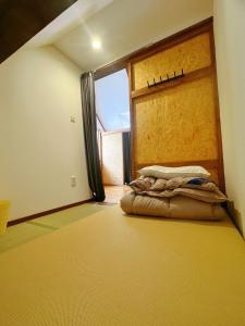 Postel nebo postele na pokoji v ubytování Amigo guest house + 17 fotografií