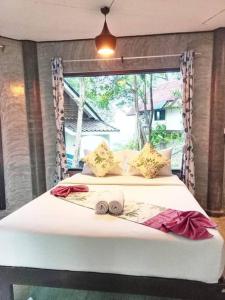 Postel nebo postele na pokoji v ubytování Sea view cliff cabin house kantiang bay