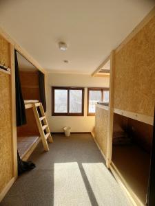 Postel nebo postele na pokoji v ubytování Amigo guest house