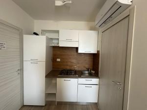 Kuchyň nebo kuchyňský kout v ubytování chalet del sole