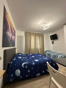 Postel nebo postele na pokoji v ubytování chalet del sole