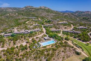 an aerial view of a resort with a pool at Résidence Les Terrasses de Rondinara in Bonifacio