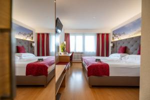 Ένα ή περισσότερα κρεβάτια σε δωμάτιο στο Hotel Vorab - Kulinarische Vielfalt