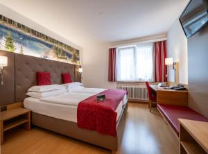 Ένα ή περισσότερα κρεβάτια σε δωμάτιο στο Hotel Vorab - Kulinarische Vielfalt