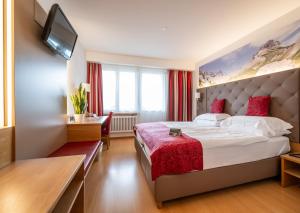Ένα ή περισσότερα κρεβάτια σε δωμάτιο στο Hotel Vorab - Kulinarische Vielfalt