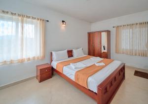 Postel nebo postele na pokoji v ubytování Cucuu Nest Villa Coonoor by VOYE HOMES
