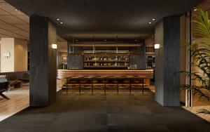a restaurant with a bar with stools at Casa Cook Madonna - Adults Only in Madonna di Campiglio +31 photos