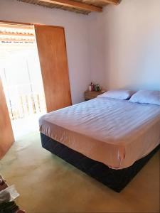 Postel nebo postele na pokoji v ubytování Casa Buena Vista