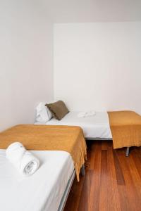 Postel nebo postele na pokoji v ubytování Ronda Sant Pere Private City Center 3Bedroom Suite B