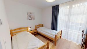 Postel nebo postele na pokoji v ubytování Apartment Randurel