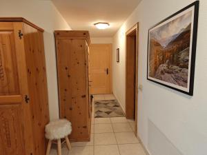 a hallway with a door leading to a room at Cuntainta Champfer in Champfer +4 photos