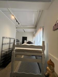 a bedroom with a bed in a room at Instituto Aterra OUT in Porto Alegre