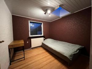 Postel nebo postele na pokoji v ubytování Cozy rooms in Rødbyhavn! Right next to Femern & Puttgarden