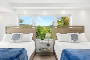 Ένα ή περισσότερα κρεβάτια σε δωμάτιο στο Luxury Ocean Front Villa 8487-88 +34 φωτογραφίες