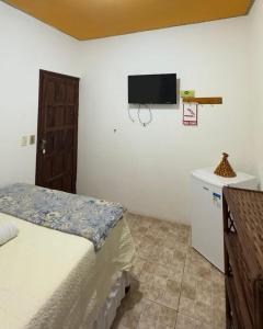 Postel nebo postele na pokoji v ubytování Pousada da Eli