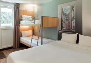 Postel nebo postele na pokoji v ubytování B&B HOTEL Corbeil-Essonnes