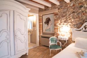 Posteľ alebo postele v izbe v ubytovaní Regia Rosetta - Royal Rooms Borghetto