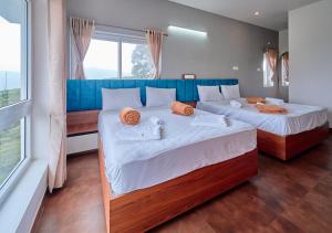 Postel nebo postele na pokoji v ubytování Cucuu Nest Villa Coonoor by VOYE HOMES